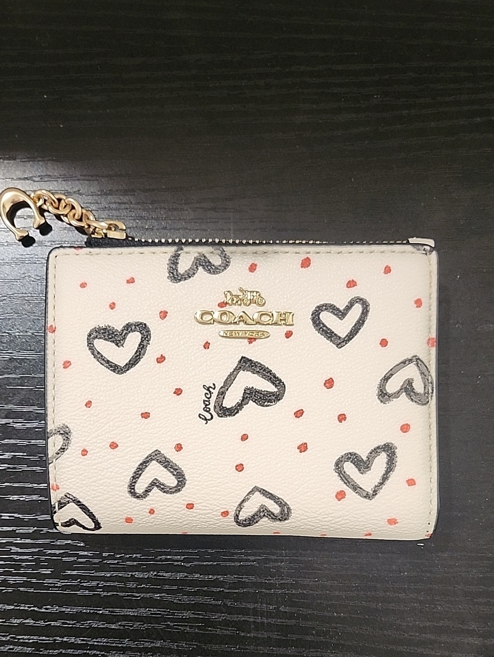 Coach Cream Zip Wallet with Black Heart Print and Red Dot Accents